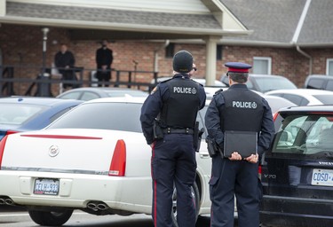 Police were keeping an eye on the Church of God  in Aylmer, Ontario on Sunday April 26, 2020. In defiance of an order by the town's chief of police, the church held a drive-in service Sunday morning. Hundreds of parishioners sat in parked vehicles watching Hildebrandt on stage and listening to his sermon over their FM radios. Police video taped the event but have not yet laid charges. Derek Ruttan/The London Free Press/Postmedia Network