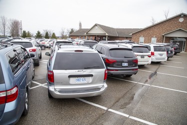 Parishioners packed the parking lot of the Church of God  in Aylmer, Ontario on Sunday April 26, 2020. In defiance of an order by the town's chief of police, the church held a drive-in service Sunday morning. Hundreds of parishioners sat in parked vehicles watching Hildebrandt on stage and listening to his sermon over their FM radios. Police video taped the event but have not yet laid charges. Derek Ruttan/The London Free Press/Postmedia Network