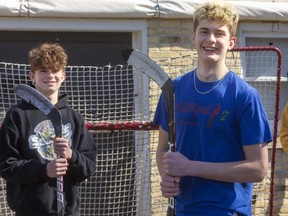 Bryce McConnell-Barker,15 centre hopes to go in the top 10 at this weekend's OHL draft. McConnell-Barker poses with his two hockey playing brothers Brodie, 14 and older brother Blake, 19 at their home in London, Ont.  (Mike Hensen/The London Free Press)