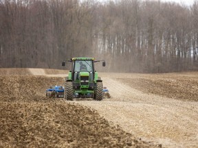 Dave McNaughton does his primary tillage of a soybean field Tuesday.  "Should have been done last fall," said McNaughton, but the weather didn't cooperate. Field conditions Tuesday were pretty good, but he'd have to wait a week or so before he could plant corn due to the frosty mornings. McNaughton says the average starting time for planting corn is around the April 15-16 but it all depends on the weather, noting that last year, some corn was still being planted in June due to the cold, wet spring.  A London Free Press letter-writer thinks we should do more to protect farmland from development. (Mike Hensen/The London Free Press)