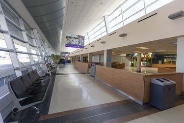 The empty main terminal building at London International Airport, where they've dropped from 30 flights a day, to one. (Mike Hensen/The London Free Press)