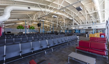 More than 600 seats sit empty in London International Airport's departure lounge. Due to shutdowns from COVID-19 they've dropped from 30 flights a day, to one. (Mike Hensen/The London Free Press)