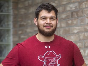 Sage Doxtator of Glencoe plays football for New Mexico State as a left offensive tackle, a fairly opposing lineman at 6' 7" and 320 pounds.  Mike Hensen/The London Free Press