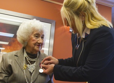 London's Fanny Goose receives the Queen's Diamond Jubilee Medal from Susan Truppe, then MP for London North Centre, in March 2013. The decoration recognized outstanding achievement or public service on the 60th anniversary of the Queen's coronation. Goose died of heart failure Monday, April 13. (Files)