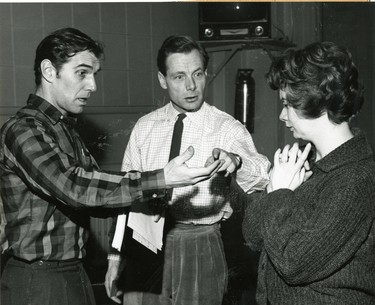 Stratford director Michael Langham, centre, talks with Leo Ciceri and Kate Reid during a rehearsal, 1962. (London Free Press files)