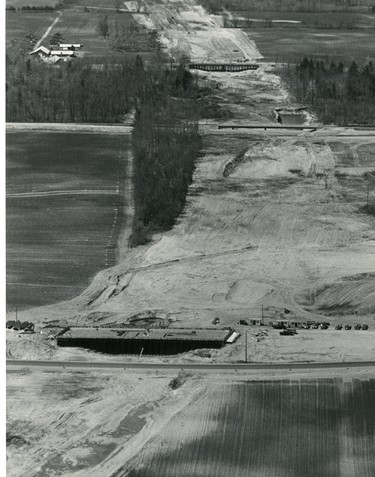Highway 402 cuts a swathe through tobacco farm land between Komoka and Mt. Brydges in this photo looking north, 1981. (London Free Press files)