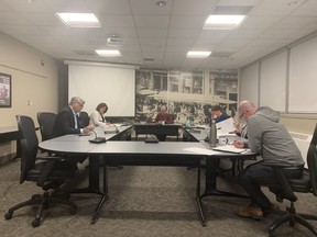 London Transit Commissioners sat farther apart, and some joined by conference call, to maintain physical distance at a Thursday meeting to address the COVID-19 pandemic. (MEGAN STACEY, The London Free Press)