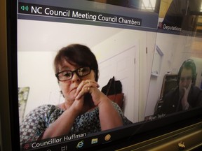 Due to social-distancing requirements during the COVID-19 pandemic alert, some members of Norfolk council participated in Tuesday’s council meeting from remote locations via video link. Among them was Waterford Coun. Kim Huffman, who tabled a resolution asking Dr. Shanker Nesathurai, Norfolk and Haldimand’s medical officer of health, to re-think his public health order regarding bunkhouses. – Monte Sonnenberg photo