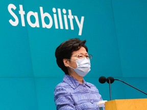 Hong Kong Chief Executive Carrie Lam, wearing a mask due to the ongoing global outbreak of the coronavirus (COVID-19), speaks during a news conference in Hong Kong, China May 26, 2020. REUTERS/Tyrone Siu