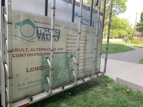 A Thames Valley District school board truck loaded with two broken window panes was parked outside London South Collegiate Institute on Monday. DALE CARRUTHERS / THE LONDON FREE PRESS