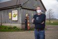 Mike Van Boekel, the Unifor Local 88 plant chairperson at the General Motors-owned Cami auto plant in Ingersoll, pauses in a facial mask on his farm near Innerkip, ahead of the automaker's planned return to work from the COVID-19 crisis. (Derek Ruttan/The London Free Press)