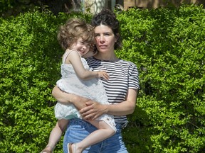 Leia Beland with one of her five children, four-year-old Bronwyn. (Derek Ruttan/The London Free Press)