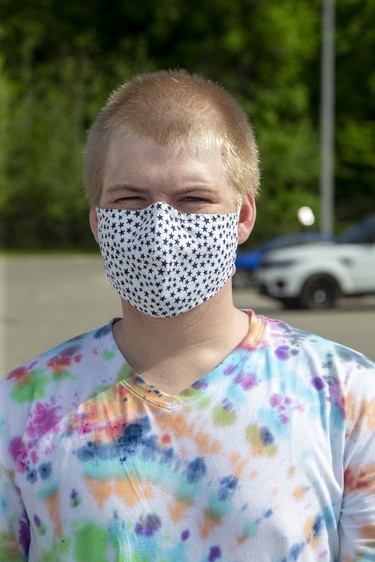 Owen Thompson, 21, London. "A friend made a bunch and gave them to my family". Photo shot  in London, Ont. on Wednesday May 27, 2020. Derek Ruttan/The London Free Press/Postmedia Network