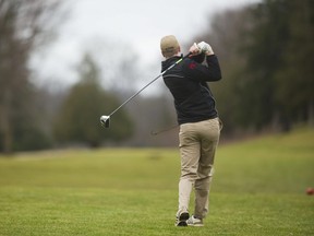 A golfer tees off at Thames Valley Golf course two years ago in March. The city has made changes at its golf courses opening this weekend to encourage distancing and keep golfers safe. (Mike Hensen/The London Free Press)