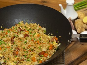 Chinese-style fried rice can easily be adapted to Thai or Indian flavours. (Mike Hensen/The London Free Press)