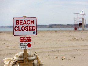 Port Stanley and other Lake Erie communities are asking people to stay away during the COVID-19 pandemic. The main beach in Port Stanley is marked closed and people are told not to go on the beach at all. (Mike Hensen/The London Free Press)