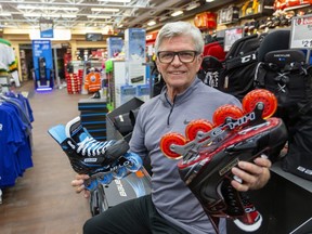 Colin Hopper, of Source for Sports, says the sales of in-line skates is way up as frustrated hockey players work out on asphalt.  (Mike Hensen/The London Free Press)