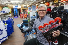 Colin Hopper, of Source for Sports, says the sales of in-line skates is way up as frustrated hockey players work out on asphalt.  (Mike Hensen/The London Free Press)