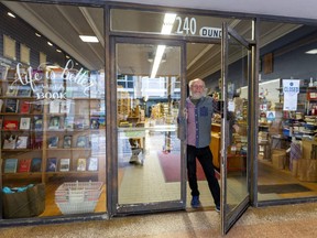 Marvin Post, of Attic Books on Dundas Street, says they're open for curbside pickup Monday, May 11, 2020 but customers aren't allowed in at this stage during Ontario's ramp-up from the COVID-19 lockdown.  (Mike Hensen/The London Free Press)