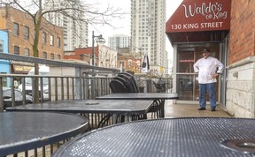 Mark Kitching surveys the patio at Waldo's on King on May 14, 2020. (Mike Hensen/The London Free Press)