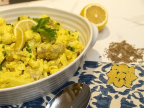 Curry, cauliflower and yogurt add Indian zest to that popular summer classic, potato salad, Jill Wilcox says. (Mike Hensen/The London Free Press)