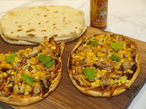 For a tangy twist on the personal pizza, top naan bread with smokey barbecue sauce, shredded chicken and Tex-Mex cheese, Jill Wilcox says. (Mike Hensen/The London Free Press)