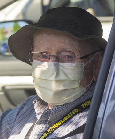 Ken Gosnell, 90 of London, about his mask said, "it works, everybody's supposed to (wear one)," in London, Ont.  Photograph taken on Tuesday May 26, 2020.  Mike Hensen/The London Free Press/Postmedia Network