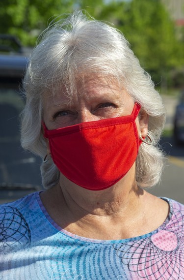 Vickkie Searle, 67 of Komoka, said about her mask, "This was courtesy of having donated blood." Photograph taken on Tuesday May 26, 2020.  Mike Hensen/The London Free Press/Postmedia Network