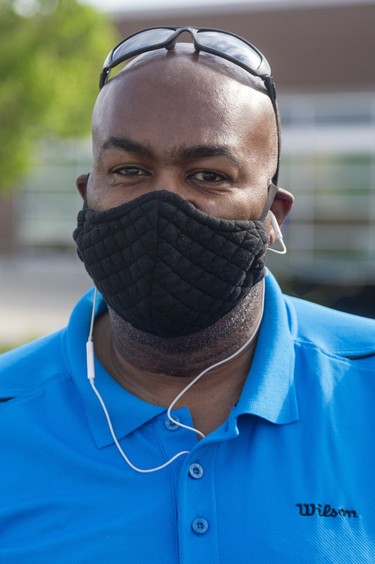 Carl Friday 56 of London Said about mask, "I got it from a web site, my wife's friend made them with two styles, one you can put a filter in." Photograph taken on Wednesday May 27, 2020.  Mike Hensen/The London Free Press/Postmedia Network