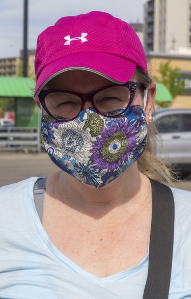Justine Lytwynec, 48 of London. "I made may own (mask), started a couple weeks ago this is the fourth pattern, trying patterns and styles that work best for glasses and breathing."   Photograph taken on Wednesday May 27, 2020.  Mike Hensen/The London Free Press/Postmedia Network