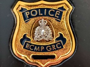 An RMCP officer’s wallet and badge were stolen from a vehicle on Young Street in Delaware around 4:30 a.m. Monday, police said. (OPP supplied photo)