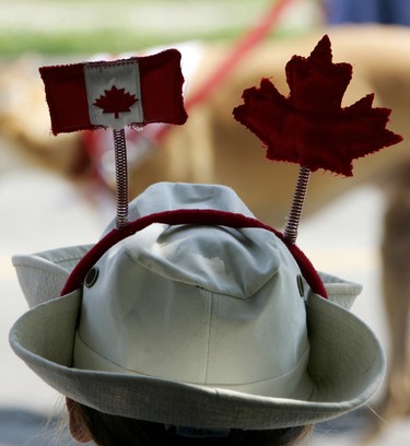 CANADA DAY 2006: July 1 festivities in Mt. Brydges saw some funky headgear, including this parade spectator. (Dave Chidley/The London Free Press)