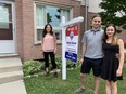 Mirella Shreve shows first-time home buyers Nathan Ferreira and Skye Camara a property in south London. (JANE SIMS, The London Free Press)