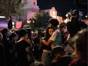 A couple holds each other, on June 1 in downtown Las Vegas while taking part in a "Black lives matter" rally in response to the death of George Floyd at the hands of police.