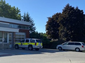 A Labour Ministry vehicle is seen at the Middlesex London Paramedic Service station in Dorchester Friday morning. A female paramedic was taken to hospital earlier in the day after suffering what officials described as a "major medical event" at work.
