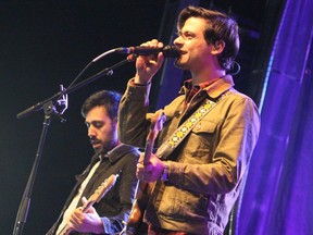 Bassist Nick Dika and guitarist Mike DeAngelis of Arkells perform at the East Coast Garden Party at Snye Point Park in Fort McMurray, Alta. on Saturday, August 26, 2017. (Vincent McDermott/Postmedia Network)