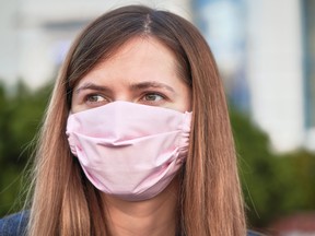 A young woman with handmade face mask