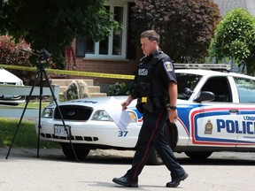 A London police officer is part of a heavy police presence on Pochard Lane Sunday, June 21, 2020, following the fatal shooting of Bill Horrace, 44, of Toronto. DALE CARRUTHERS / THE LONDON FREE PRESS