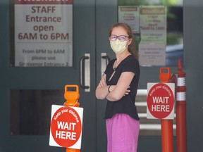 Megan Butler is a COVID-19 screener at St. Joseph's Health Care London, which is joining London Health Sciences Centre in gradually resuming more urgent surgeries, procedures and some outpatient clinical services put on hold amid the pandemic. (Derek Ruttan/The London Free Press)
