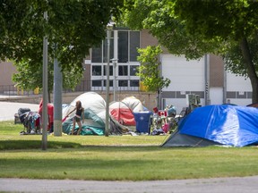 A tent city emerged at Queens Park beside the Western Fair Raceway in June 2020. (Derek Ruttan/The London Free Press)
