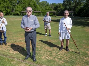 L to R  Bernard Goure, Edgar Hooper, Eric Hinton and Verne Trevail are volunteers at the Thistle Lawn Bowling Club in London, Ont. (Derek Ruttan/The London Free Press)