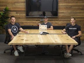 L to R Mike Delorenzi, president of Northern, Andrew McClenaghan, president of Digital Echidna, and Corey Dubeau, Northern's vice-president of marketing, at the Northern office. (Derek Ruttan/The London Free Press)