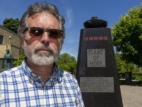 Grant Maltman, curator at Banting House museum in London, was told Saturday night that vandals had broken its outdoor Flame of Hope, first lit by the Queen mum in 1989.  Maltman hopes the repairs are simple since the museum like many others has been closed due to the COVID-19 pandemic. Photograph taken on Sunday June 14, 2020.  Mike Hensen/The London Free Press