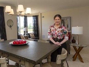 Leia Smoudianis, the marketing manager for Drewlo homes shows off one of their new apartment suites on South Carriage Road off of Hyde Park Road in London, Ont.  (Mike Hensen/The London Free Press)