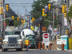 Dundas Street near Rectory Street is closed as sewer and watermain replacement work continues on Friday, June 26, 2020.  (Mike Hensen/The London Free Press)