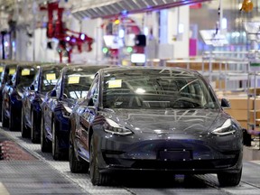 Tesla China-made Model 3 vehicles are seen during a delivery event at its factory in Shanghai, China January 7, 2020. (REUTERS/Aly Song/File Photo)