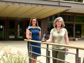 Stratford Festival executive director Anita Gaffney and Pelee Island Winery sales rep Lori Lupton show off the new labels for the limited-run Stratford Festival wines, a portion of the proceeds from which will go back to the festival to help it through the ongoing COVID-19 pandemic. Galen Simmons/The Beacon Herald/Postmedia Network