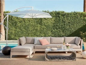 Choosing neutral coloured pool and patio furnishings inspired by natural surroundings creates a sophisticated resort look to your backyard. Piedra Outdoor Furniture Collection, CB2.ca.