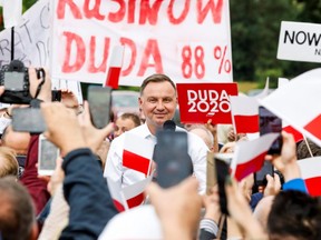 Polish President Andrzej Duda attends a meeting with local residents following his victory in a presidential election in Odrzywol, Poland July 13, 2020. (Marcin Kucewicz/Agencja Gazeta via REUTERS)