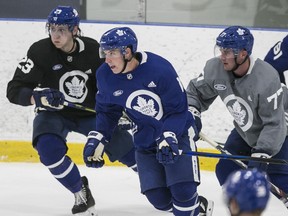 Mitch Marner (centre) is shown at practice with teammates as the Toronto Maple Leafs opened training camp this week. Craig Robertson/Toronto Sun/